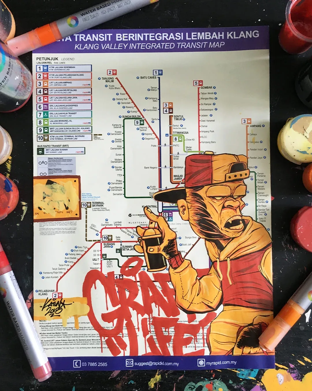 Karya karakter beruk di atas peta transit Lembah Klang
